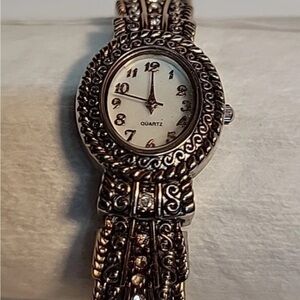 Ornate vintage women cuff watch silver with crystal accent